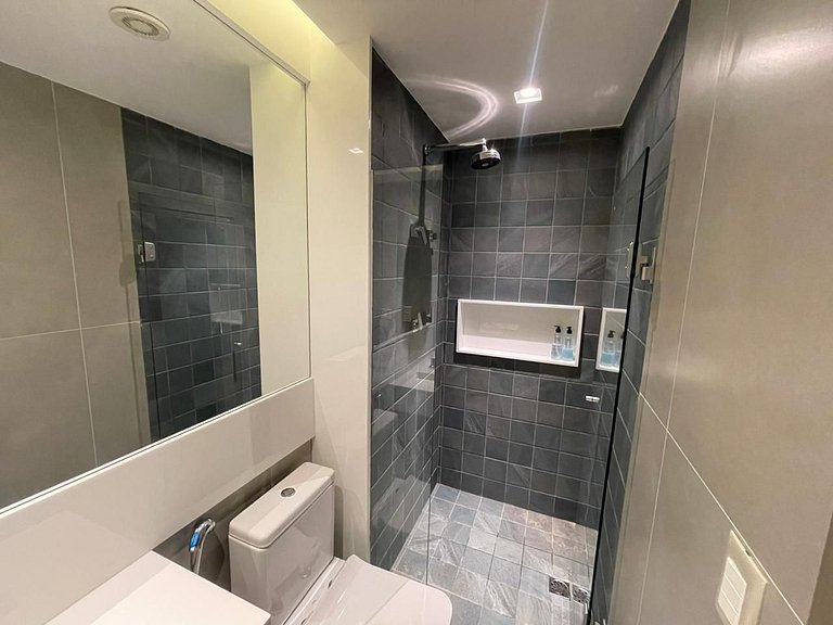 Confortável suíte com dois ambientes
